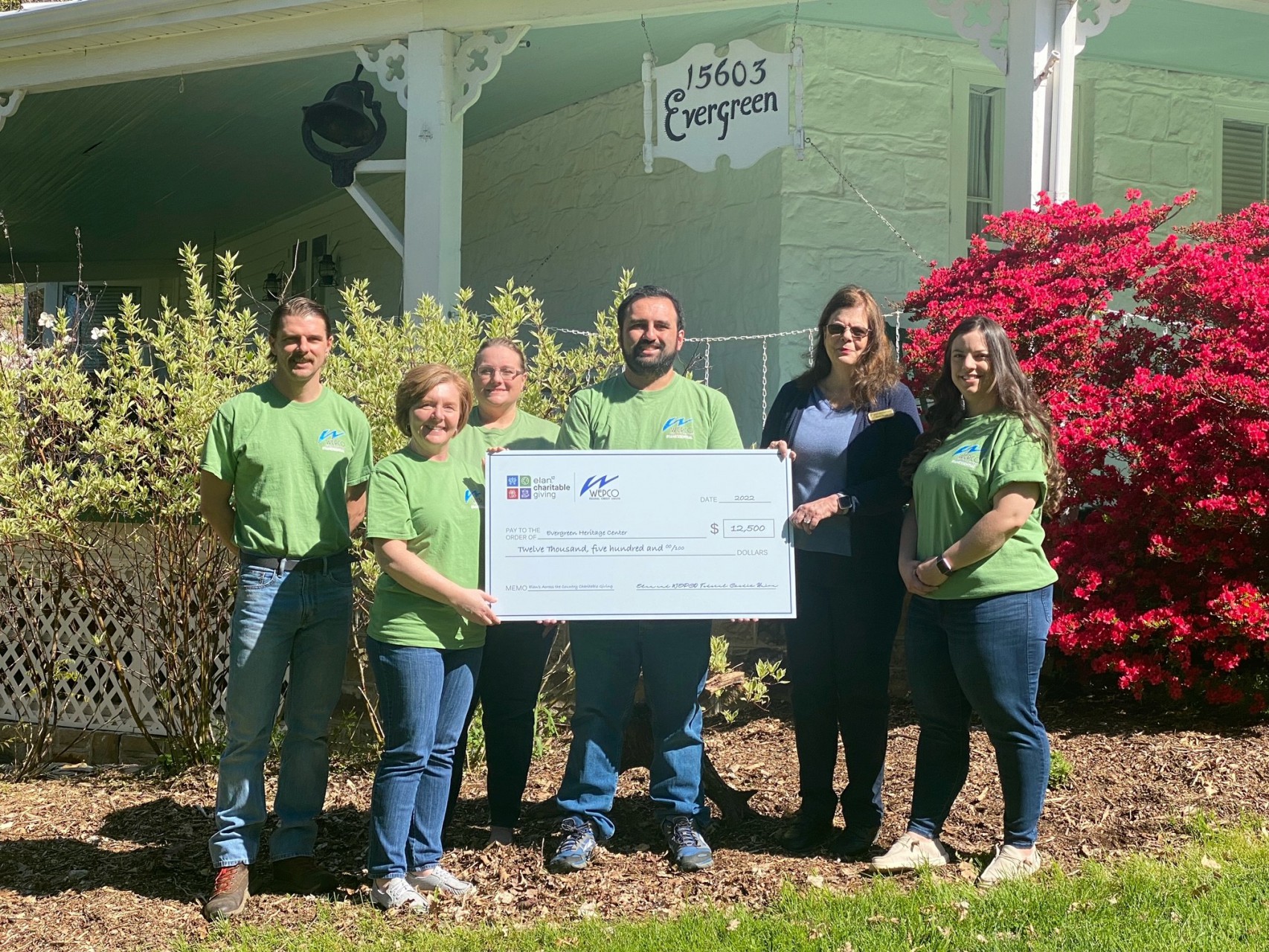 WEPCO presenting check to Evergreen